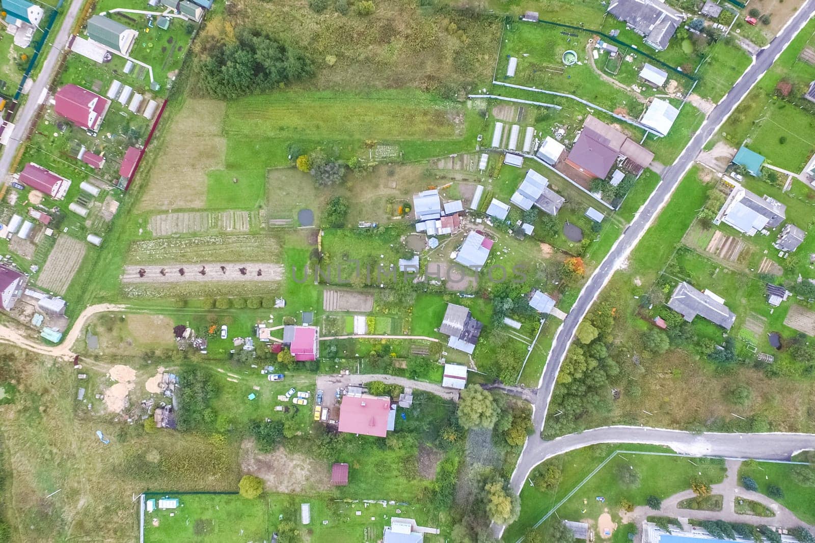 Top view of the village, fields and forests near the village