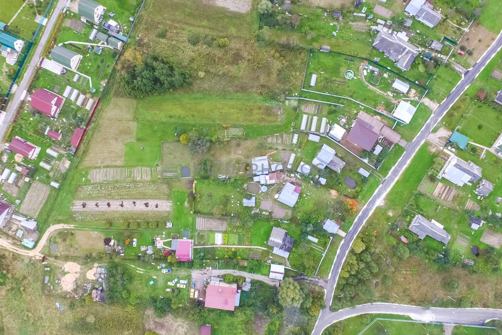 Top view of the village, fields and forests near the village