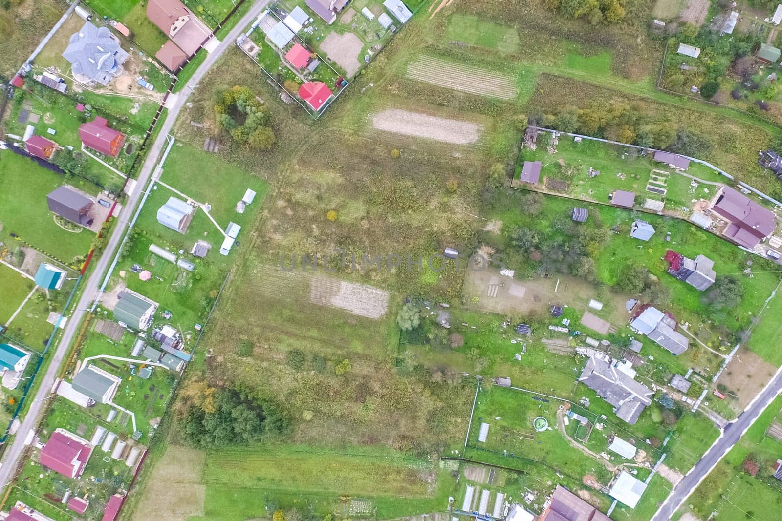 Top view of the village, fields and forests near the village