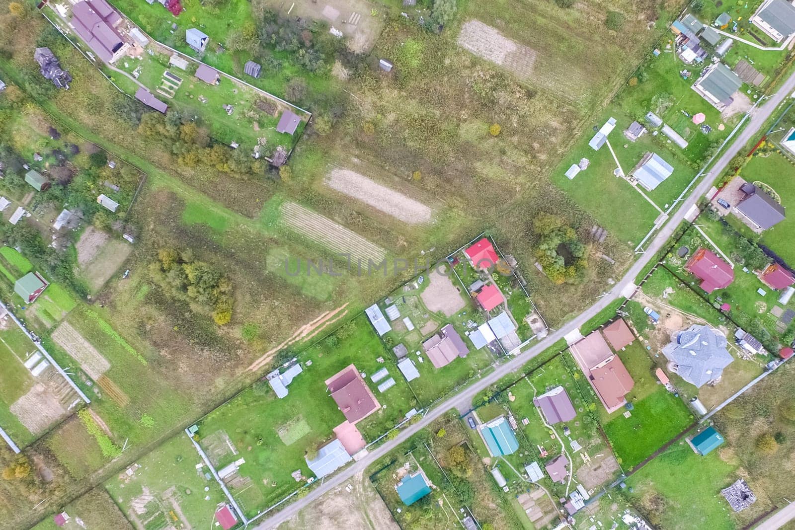 Top view of the village, fields and forests near the village