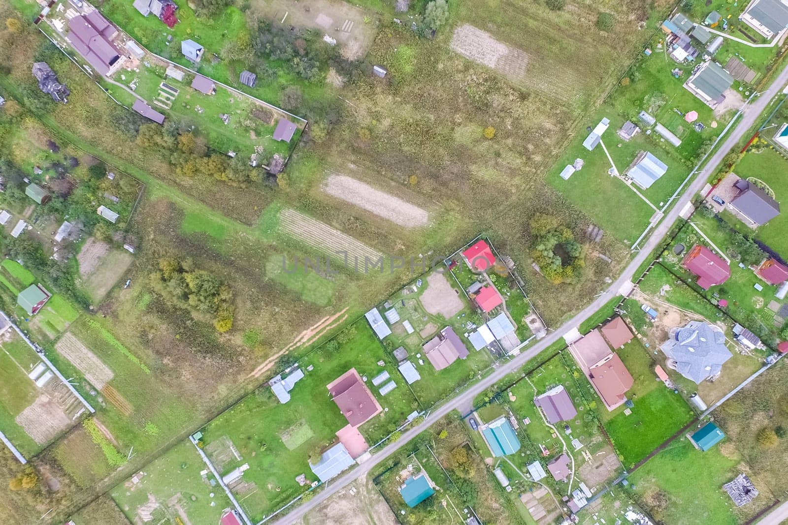 Top view of the village, fields and forests near the village