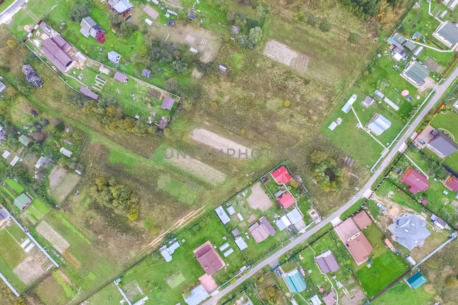 Top view of the village, fields and forests near the village