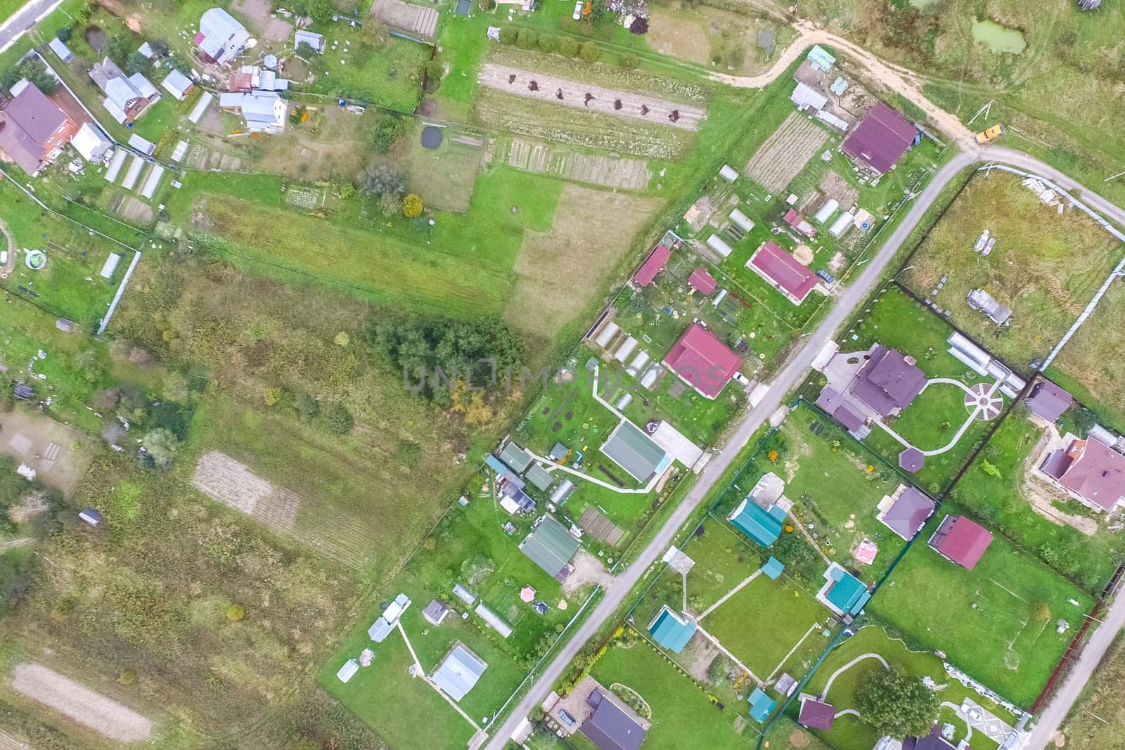 Top view of the village, fields and forests near the village
