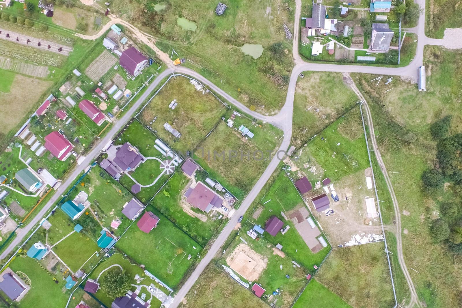 Top view of the village, fields and forests near the village