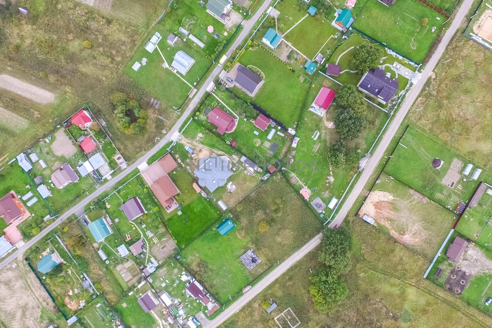 Top view of the village, fields and forests near the village