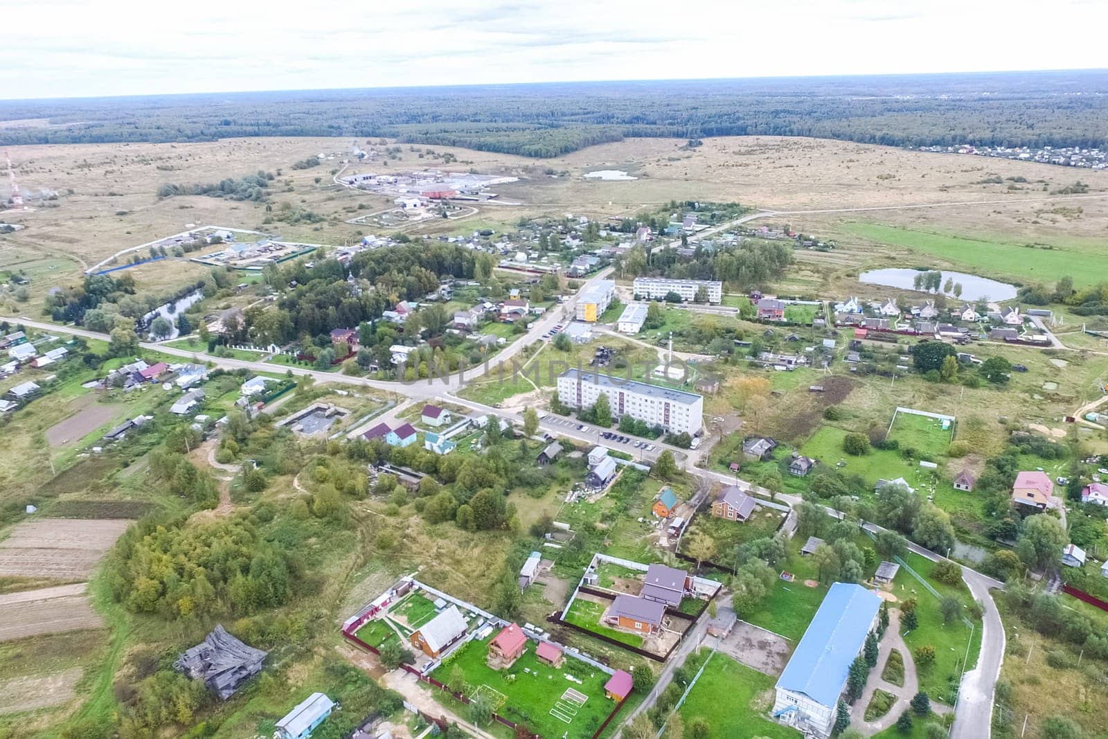 Top view of the village, fields and forests near the village