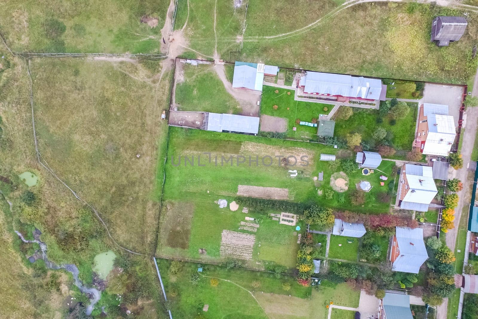 Top view of the village, fields and forests near the village