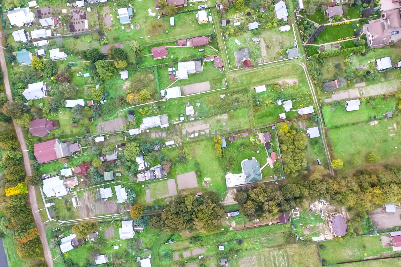 Top view of the village, fields and forests near the village