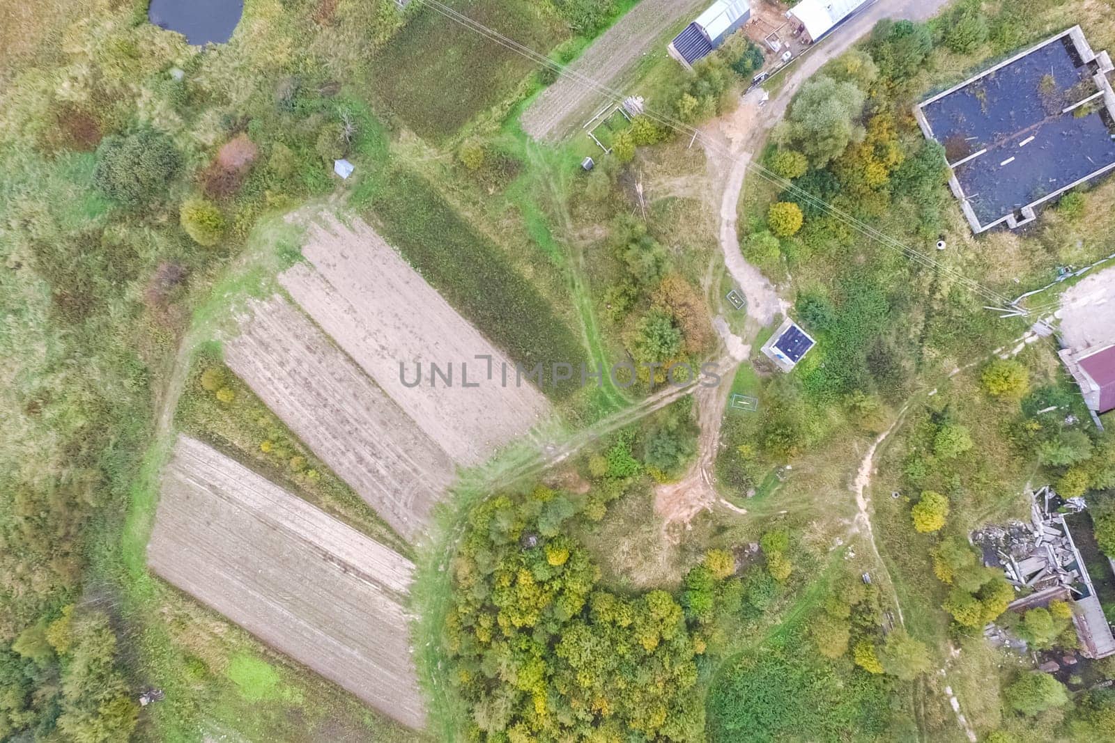 Top view of the village, fields and forests near the village