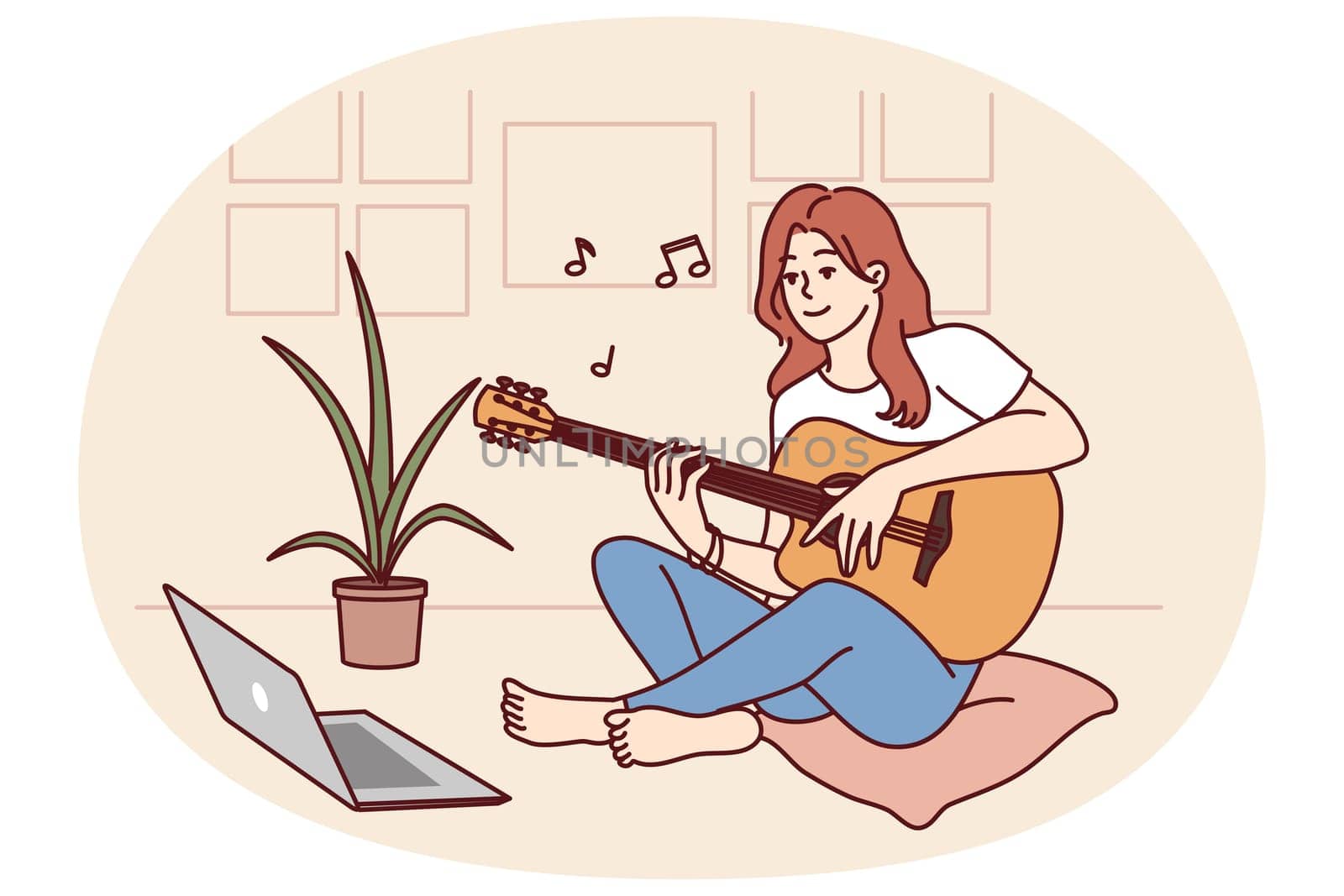 Woman plays guitar sitting in front of laptop and gets musical skills from watching video lesson on internet. Girl enjoys musical hobby and performance of popular compositions on guitar