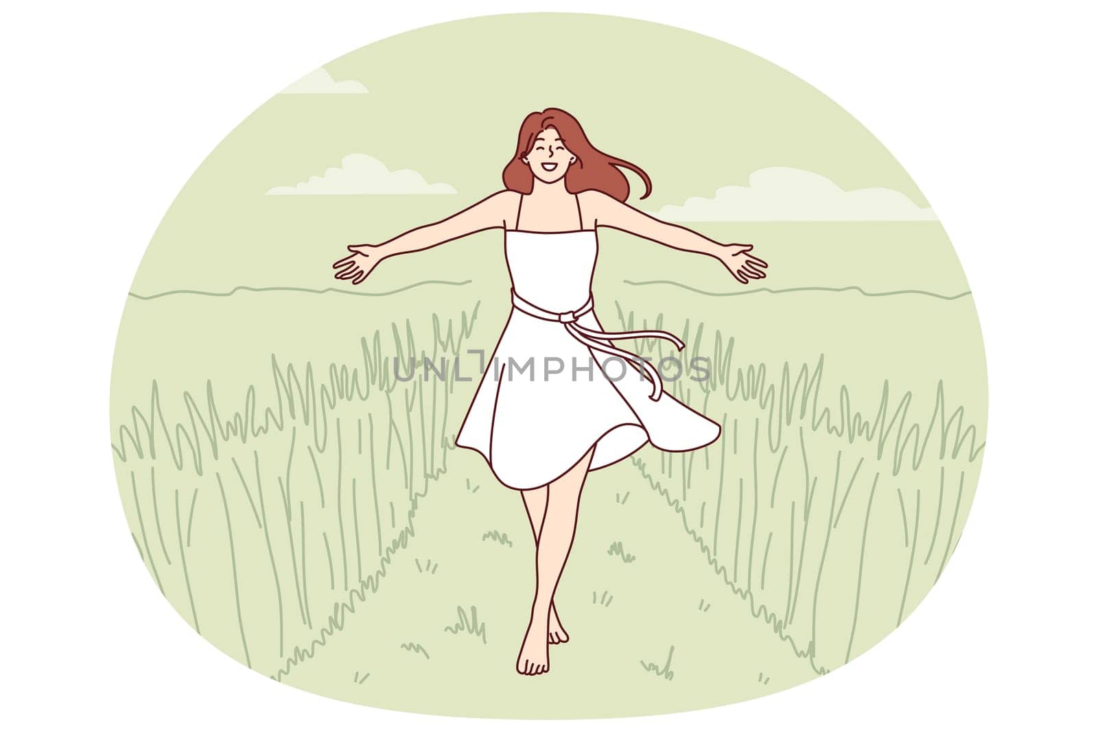 Woman walks along path among tall grass enjoying beautiful nature in rural or farming area. Girl in dress enjoys walk in wild nature or agricultural field in ecologically clean place.
