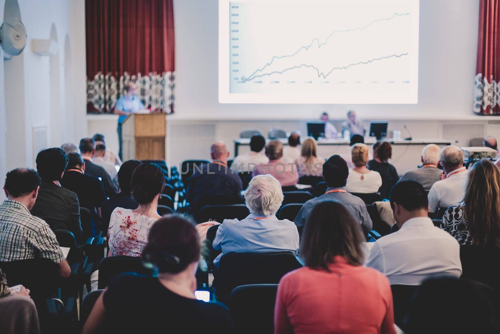 Speaker at Business Conference and Presentation. Audience at the conference hall. Business and Entrepreneurship.