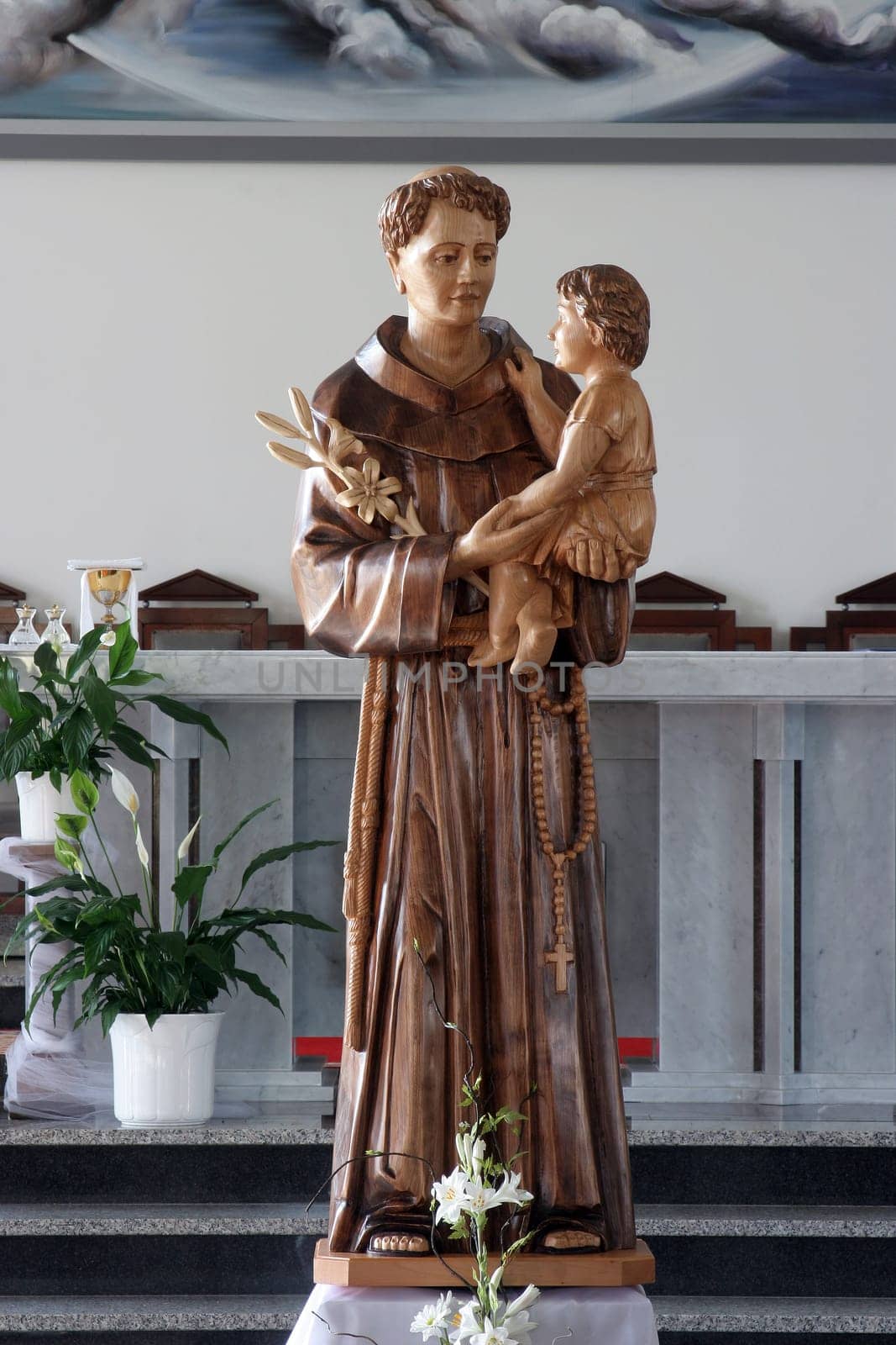Statue of Saint Anthony of Padua in front of the main altar in the Good Shepherd Parish Church in Brestje, Croatia