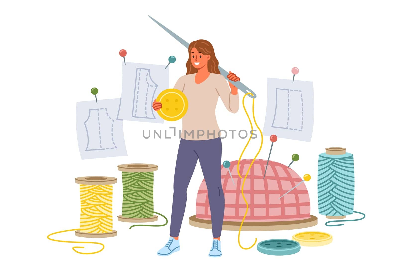 Woman seamstress holds large needle and button, standing near threads and cutting sheets for making handmade clothes. Girl seamstress smiles enjoying creative work of developing dress designs