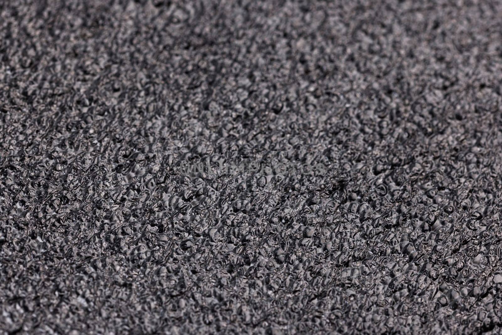 Black high-impact closed-cell polyethylene black foam closeup full-frame view. Specifically designed packing material.