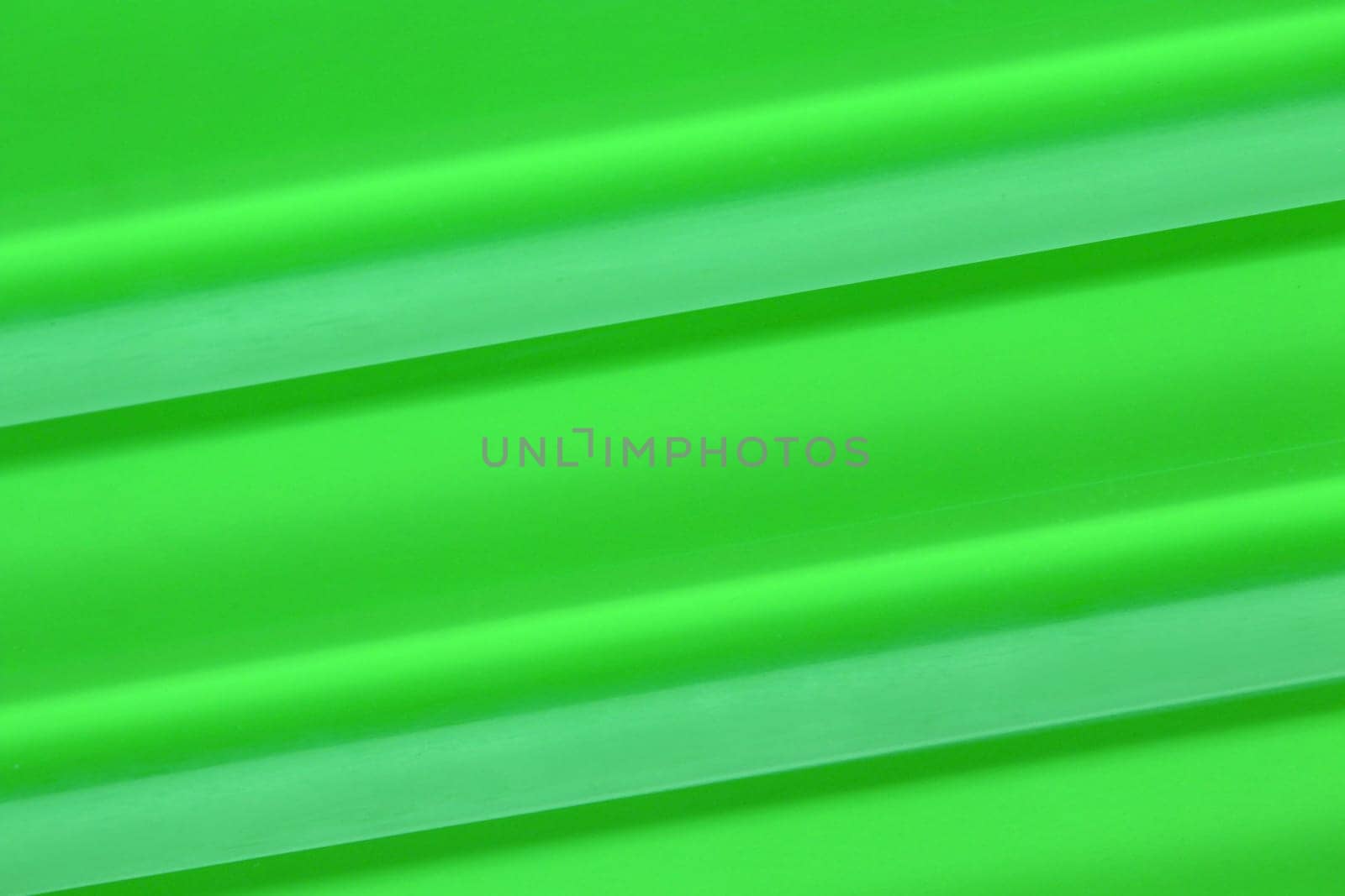 Close-up of a can green background made of glass