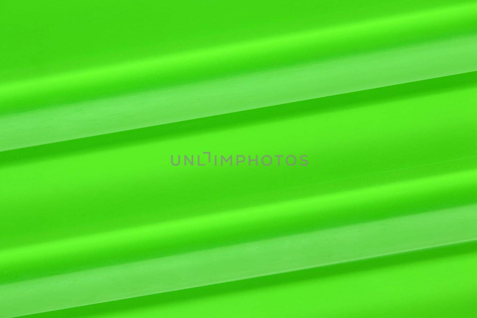 Close-up of a can green background made of glass