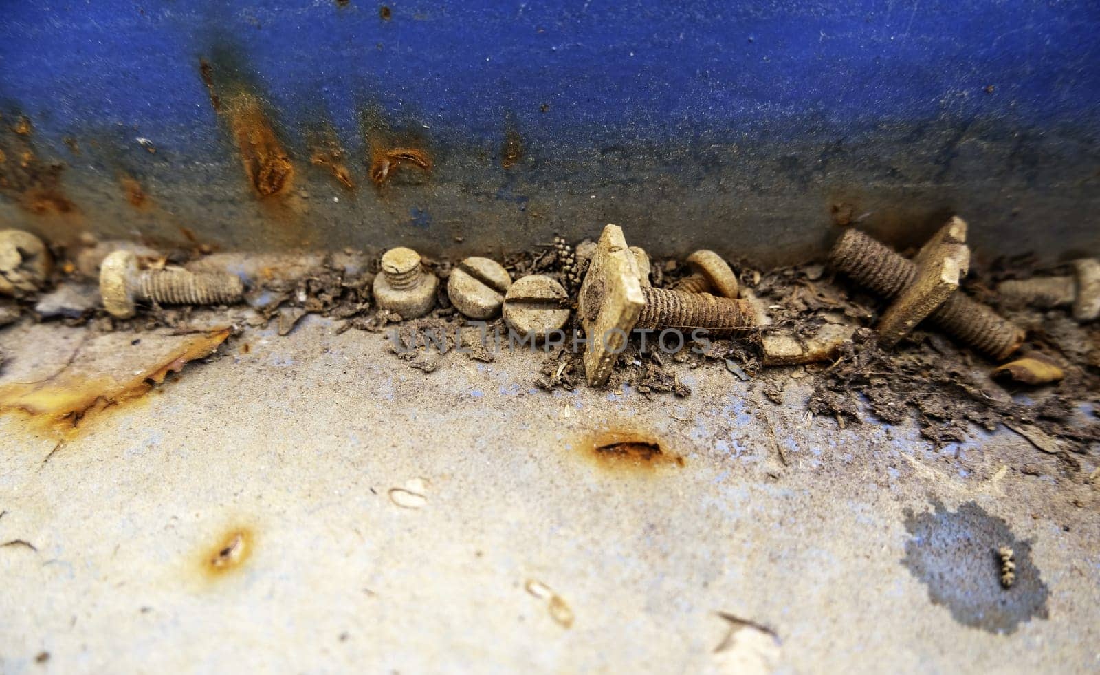 Detail of rusty and damaged screws and nuts