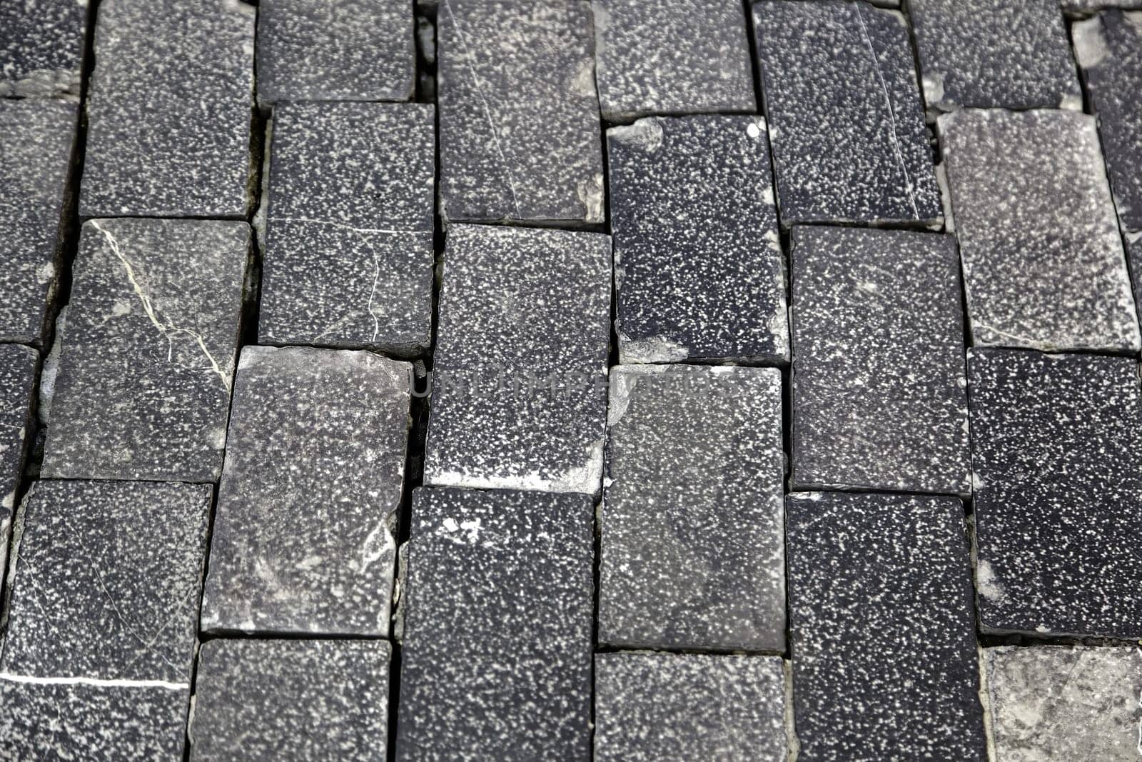 Detail of urban ground wet from the rain