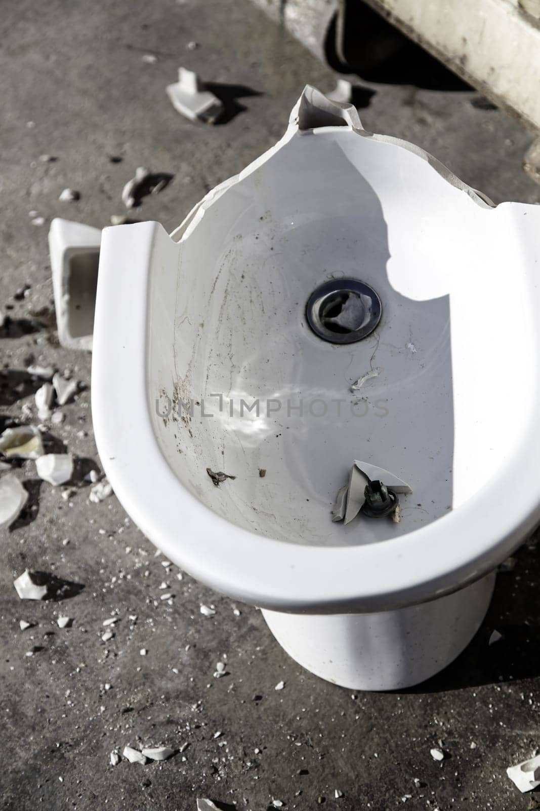 Detail of old and used toilet bowl, dirt and destruction