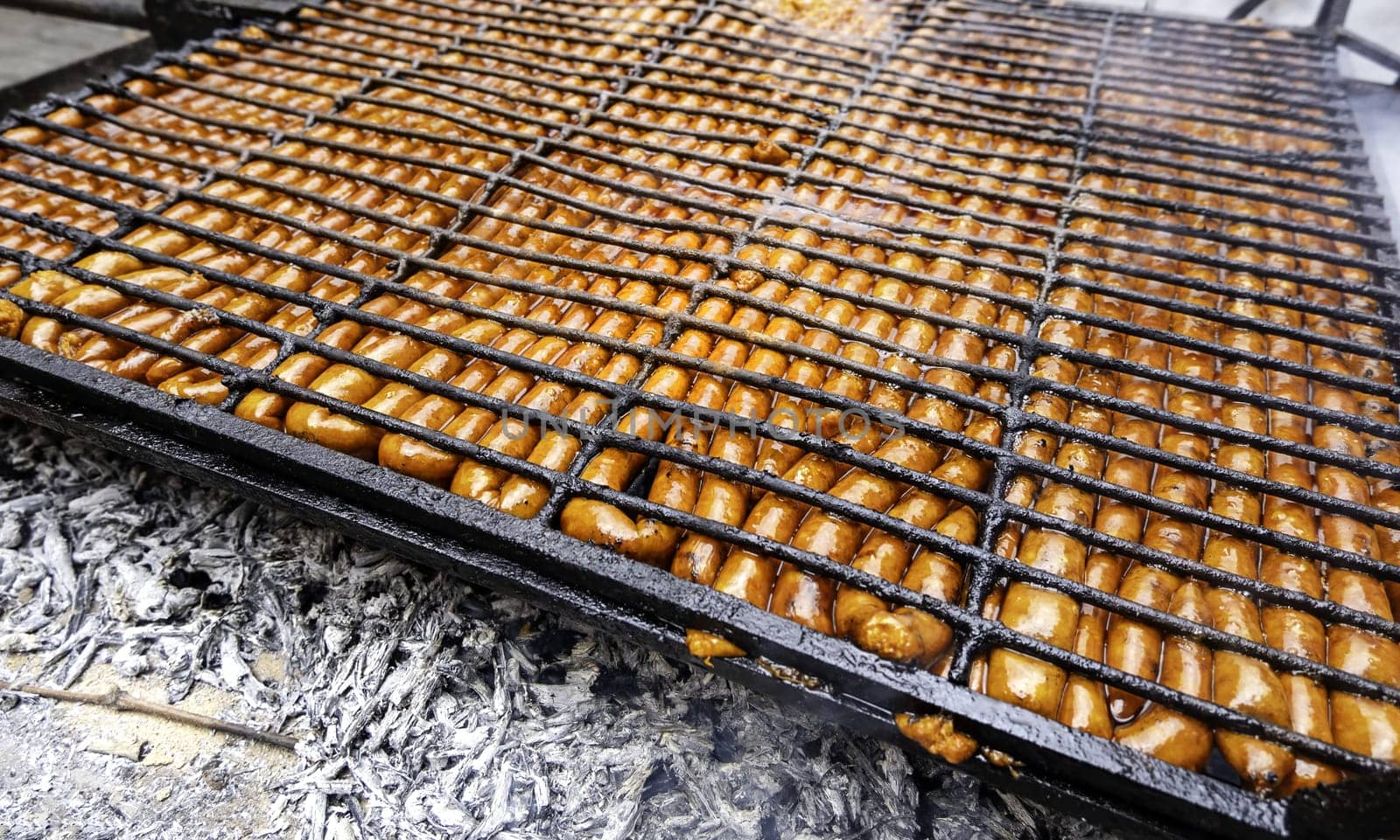 Detail of grilled pork sausage, greasy food