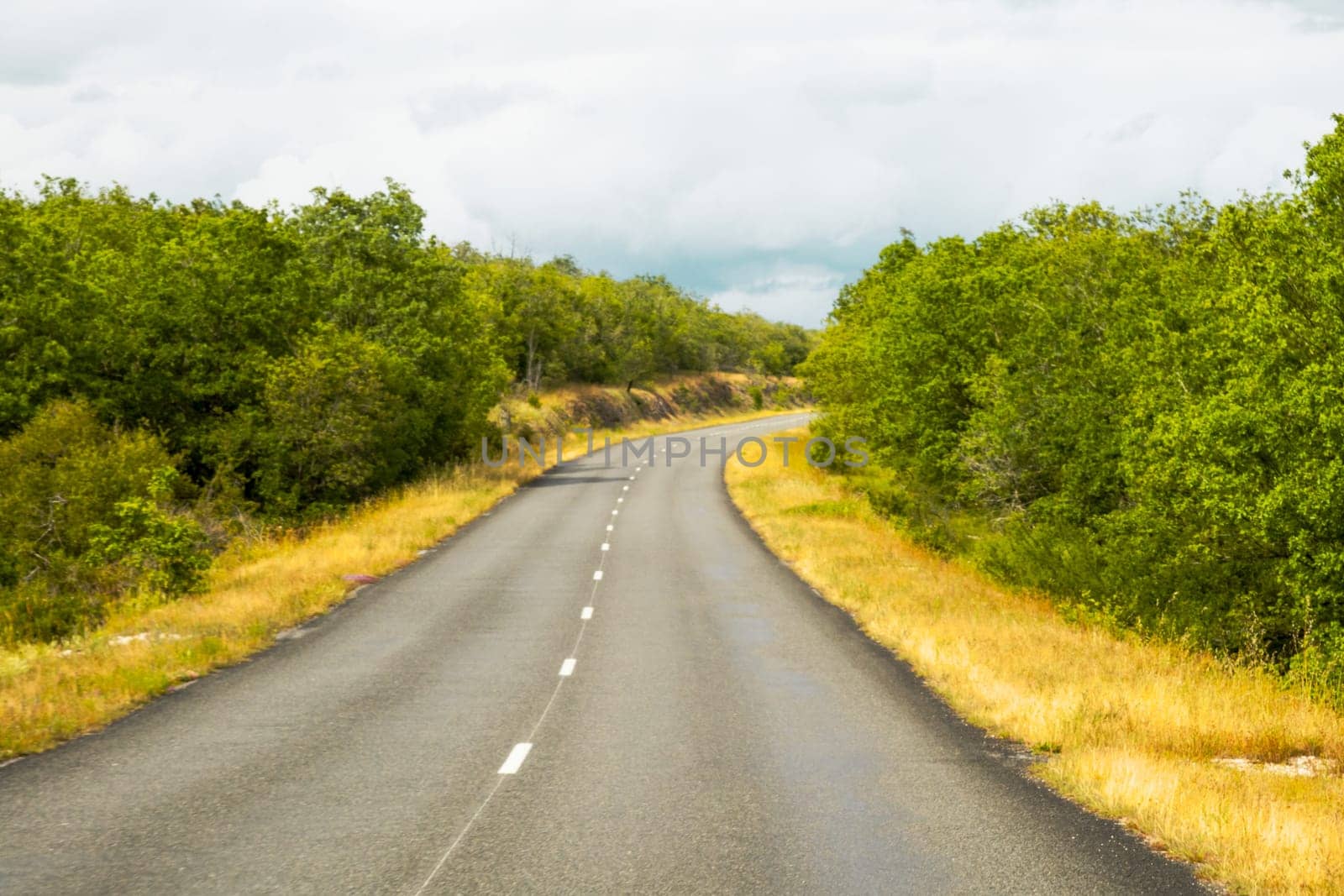 The French countryside seen while driving on a small road in the Lot Valley in France