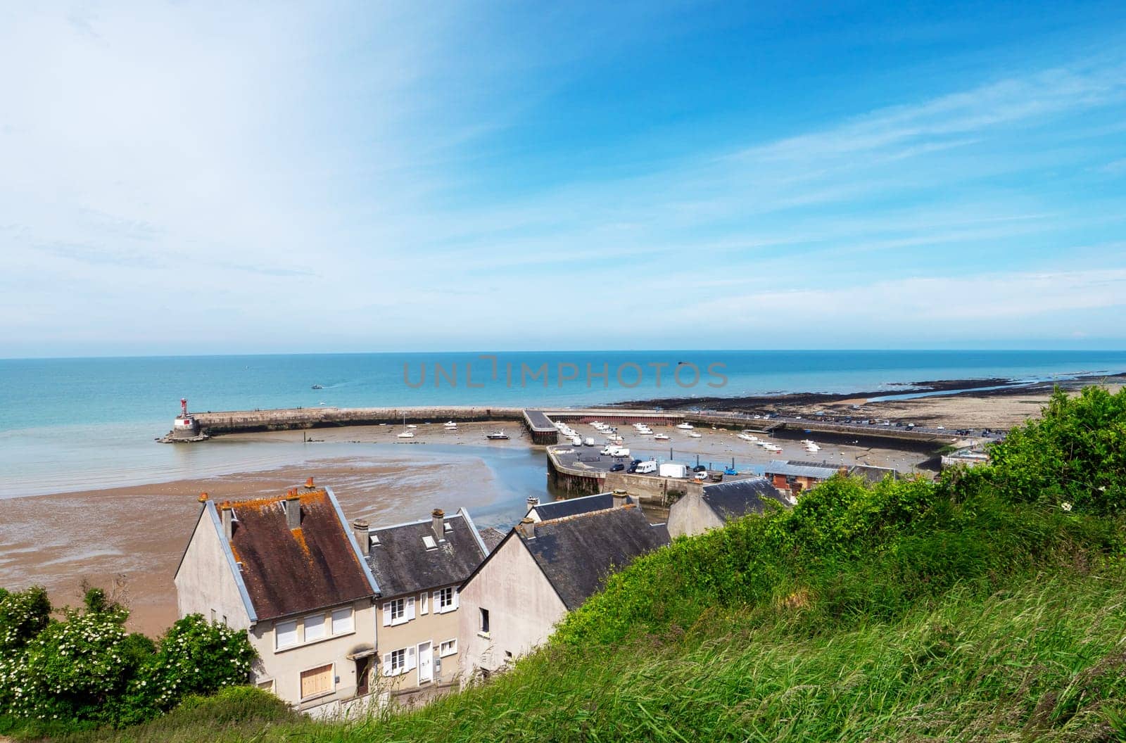 view of town of Port-en-Bessin, a commune in the Calvados department in the Basse-Normandie region in northwestern France.