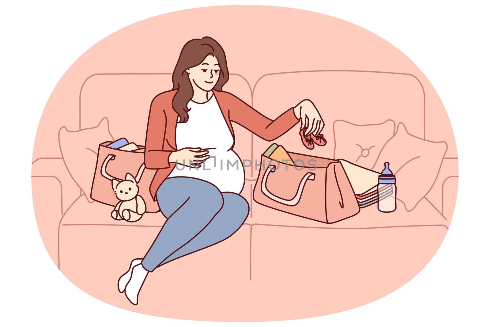 Pregnant woman is packing things for unborn child in bag going to maternity hospital before giving birth. Pregnant girl is sitting on couch getting ready for motherhood and raising baby