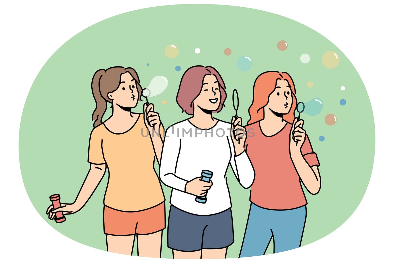 Teenage girls inflate soap bubbles enjoying outdoor recreation in hot summer weather. Three high school girls love to hang out and have fun playing in park, for concept of carefree childhood