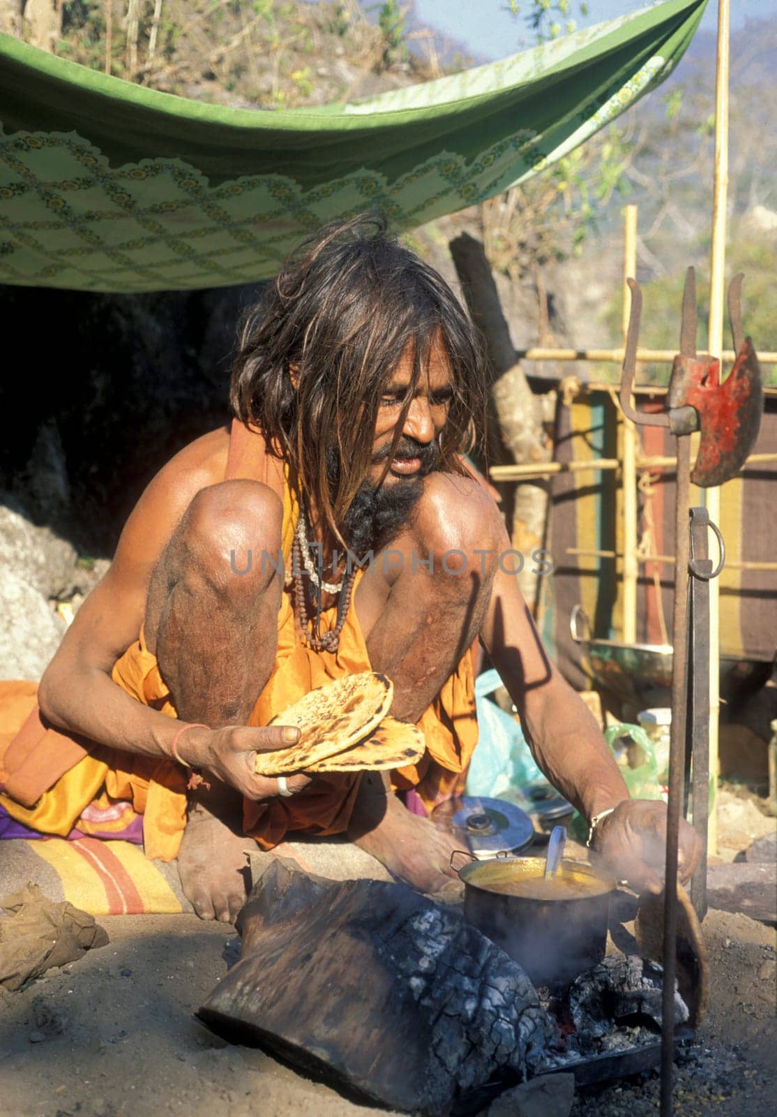 a Holy men and Street Sadhus at the Holy Ganges River in the city of Rishikesh in the Province Uttarakhand in India.  India, Rishikesh, February, 1998