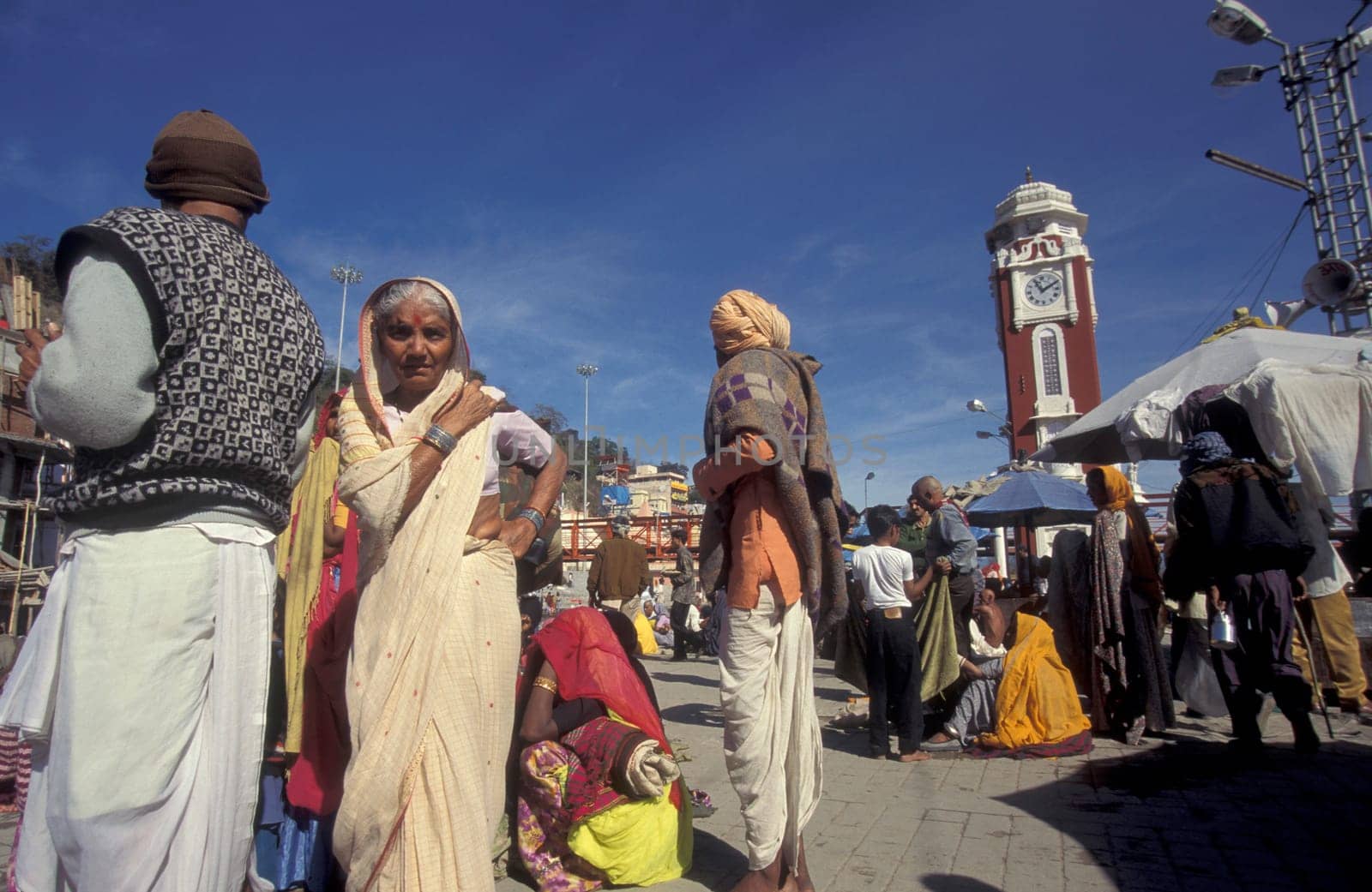 a view over public aerea with the Clock Tower at the Holy Ganges River in the city of Haridwar in the Province Uttarakhand in India.  India, Haridwar, February, 1998