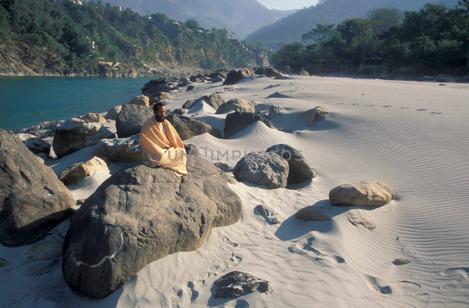 a Holy men and Street Sadhus at the Holy Ganges River in the city of Rishikesh in the Province Uttarakhand in India.  India, Rishikesh, February, 1998