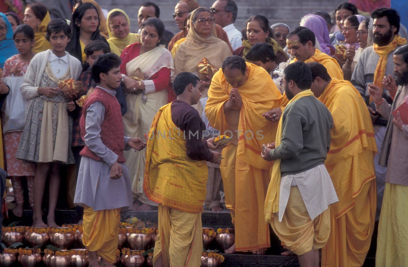 Hindi Pilgrim at a ceremony at the Holy Ganges River in the city of Haridwar in the Province Uttarakhand in India.  India, Haridwar, February, 1998
