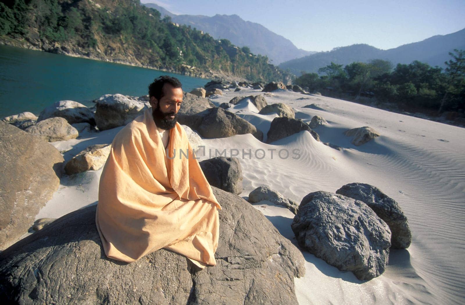 a Holy men and Street Sadhus at the Holy Ganges River in the city of Rishikesh in the Province Uttarakhand in India.  India, Rishikesh, February, 1998