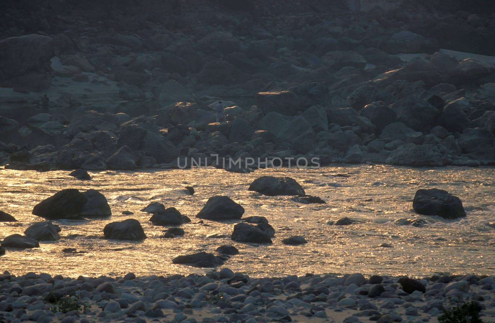 the Holy Ganges River in the city of Rishikesh in the Province Uttarakhand in India.  India, Rishikesh, February, 1998
