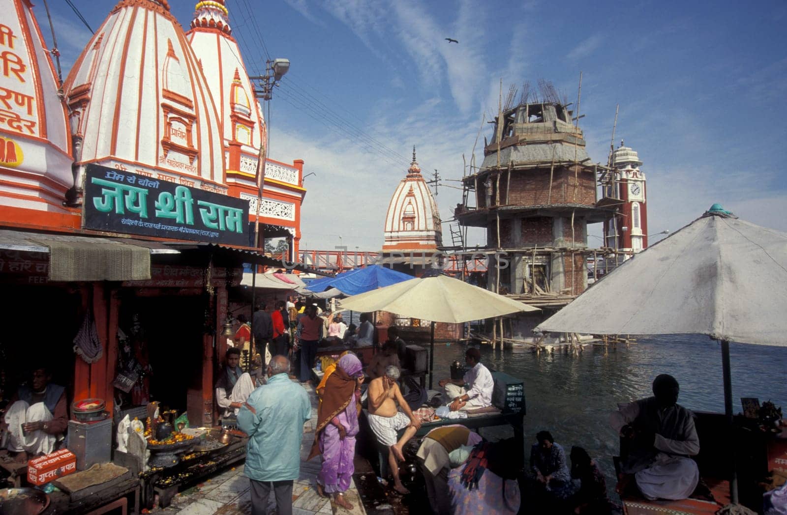 a view over public aerea with the Clock Tower at the Holy Ganges River in the city of Haridwar in the Province Uttarakhand in India.  India, Haridwar, February, 1998