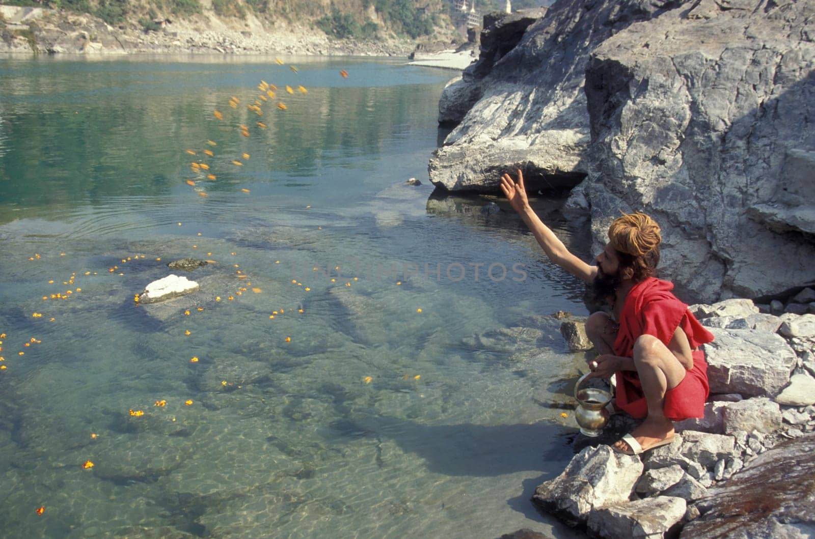 a Holy men and Street Sadhus at the Holy Ganges River in the city of Rishikesh in the Province Uttarakhand in India.  India, Rishikesh, February, 1998