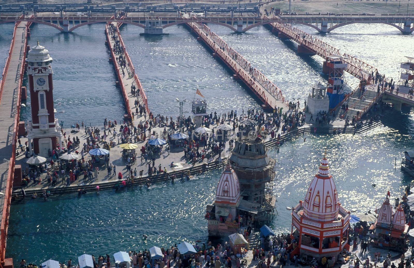 a view over public aerea with the Clock Tower at the Holy Ganges River in the city of Haridwar in the Province Uttarakhand in India.  India, Haridwar, February, 1998