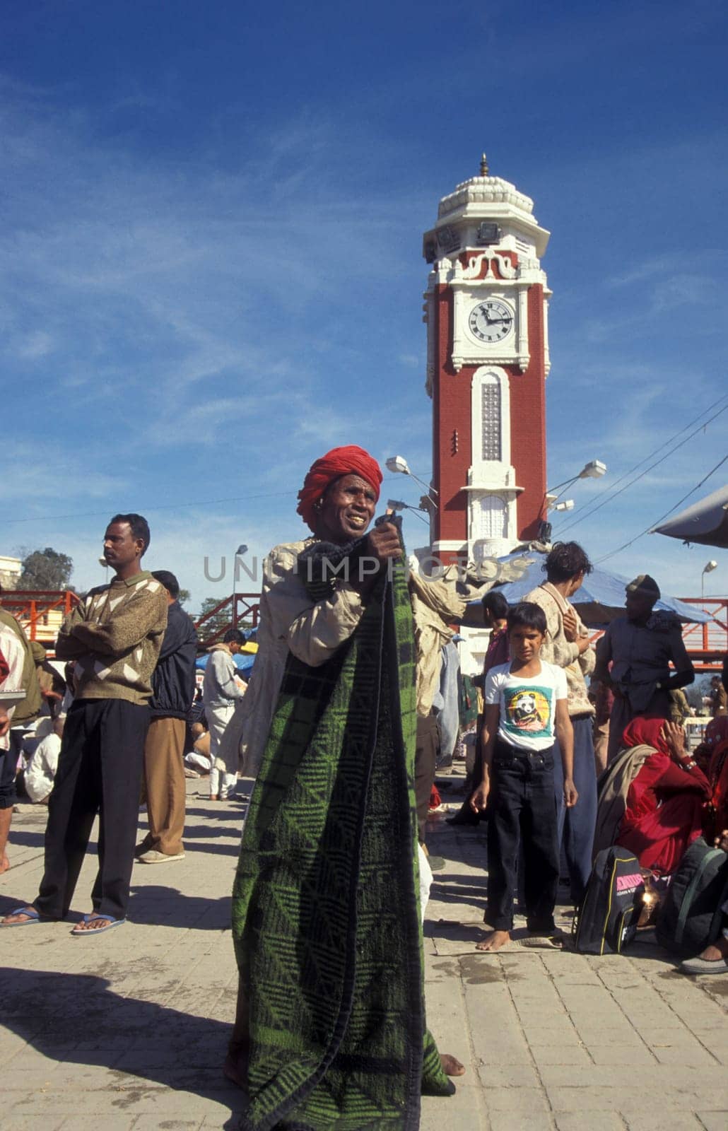 a view over public aerea with the Clock Tower at the Holy Ganges River in the city of Haridwar in the Province Uttarakhand in India.  India, Haridwar, February, 1998