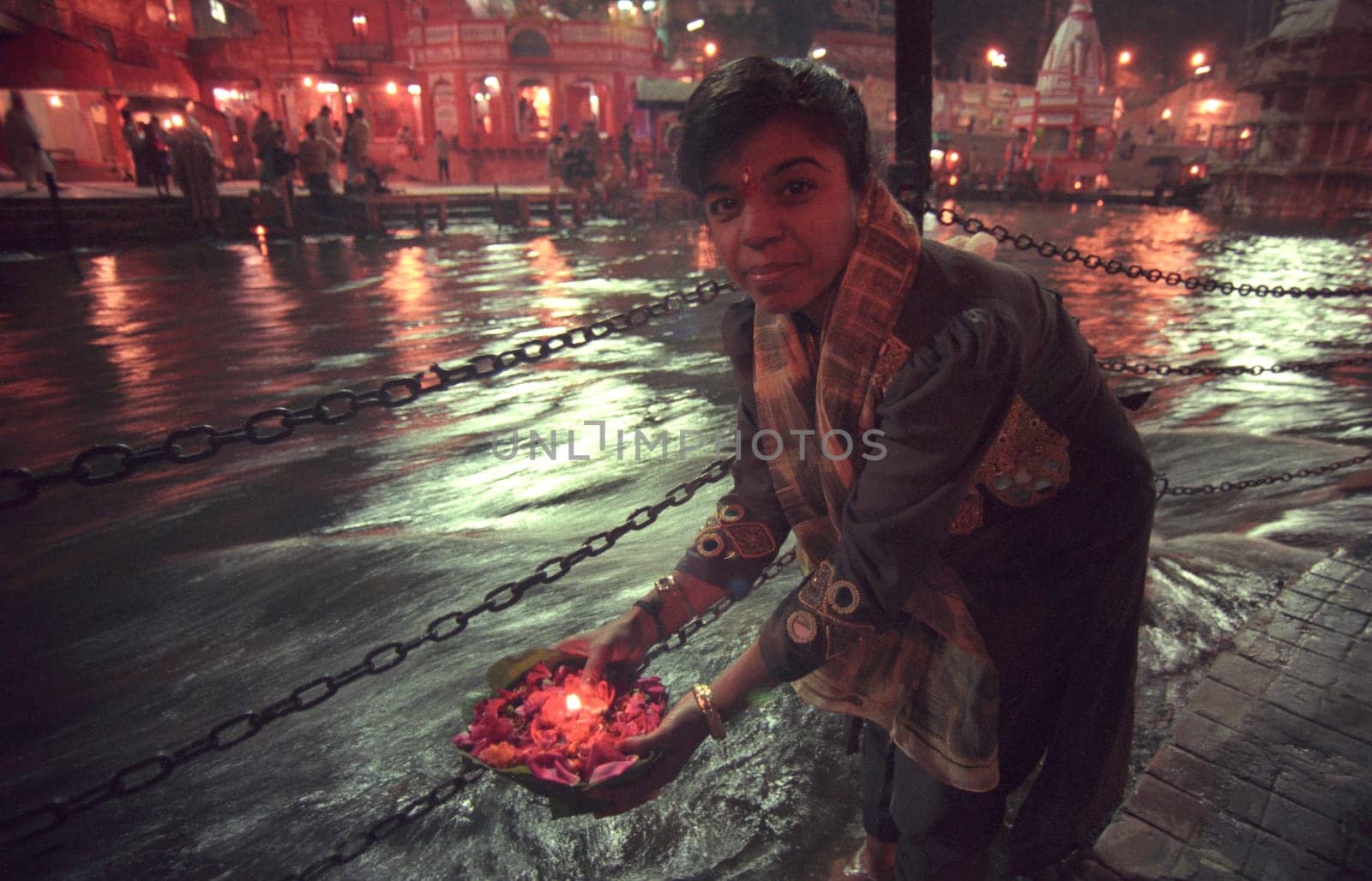 Hindi Pilgrim take a Bath in the Ganges River in the city of Haridwar in the Province Uttarakhand in India.  India, Haridwar, February, 1998