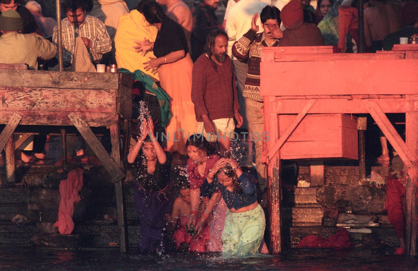 Hindi Pilgrim take a Bath in the Ganges River in the city of Haridwar in the Province Uttarakhand in India.  India, Haridwar, February, 1998