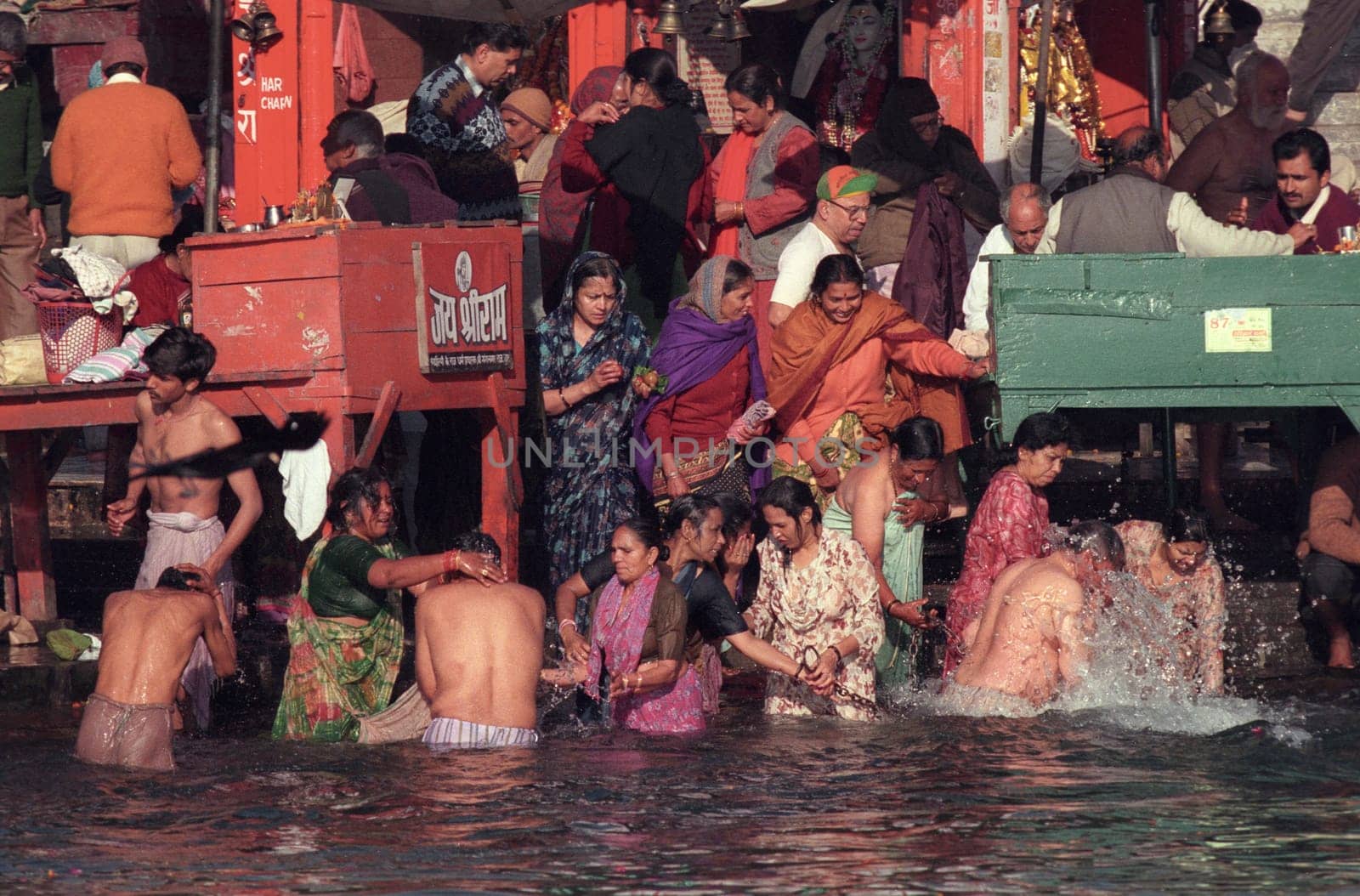 Hindi Pilgrim take a Bath in the Ganges River in the city of Haridwar in the Province Uttarakhand in India.  India, Haridwar, February, 1998