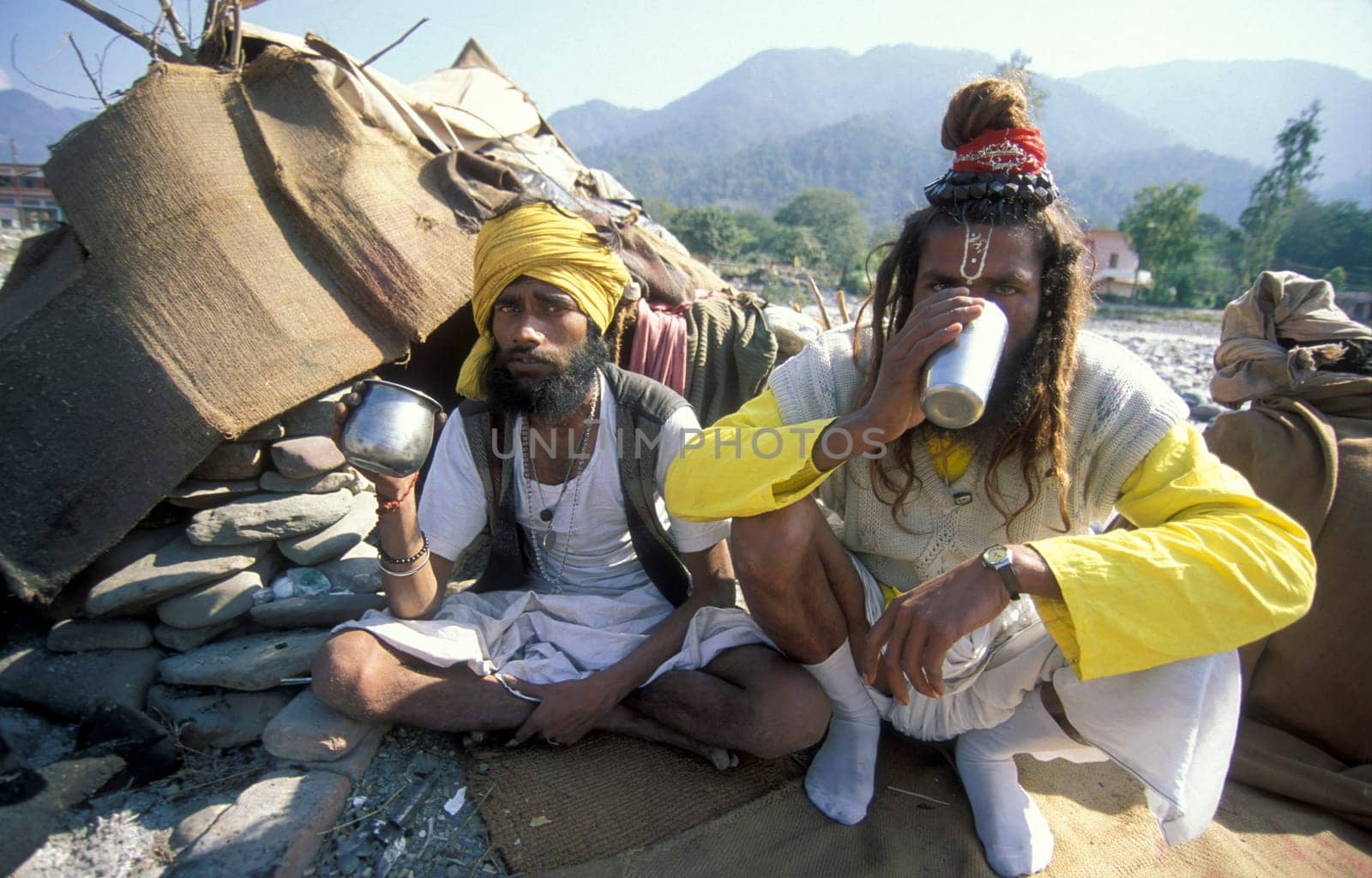 a Holy men and Street Sadhus at the Holy Ganges River in the city of Rishikesh in the Province Uttarakhand in India.  India, Rishikesh, February, 1998