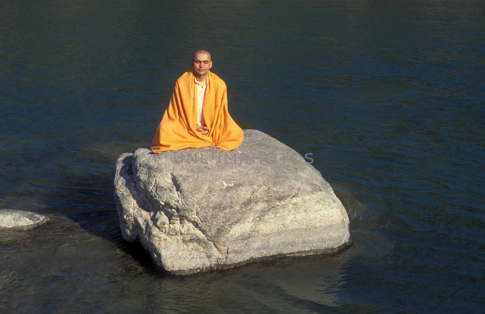 a Holy men and Street Sadhus at the Holy Ganges River in the city of Rishikesh in the Province Uttarakhand in India.  India, Rishikesh, February, 1998