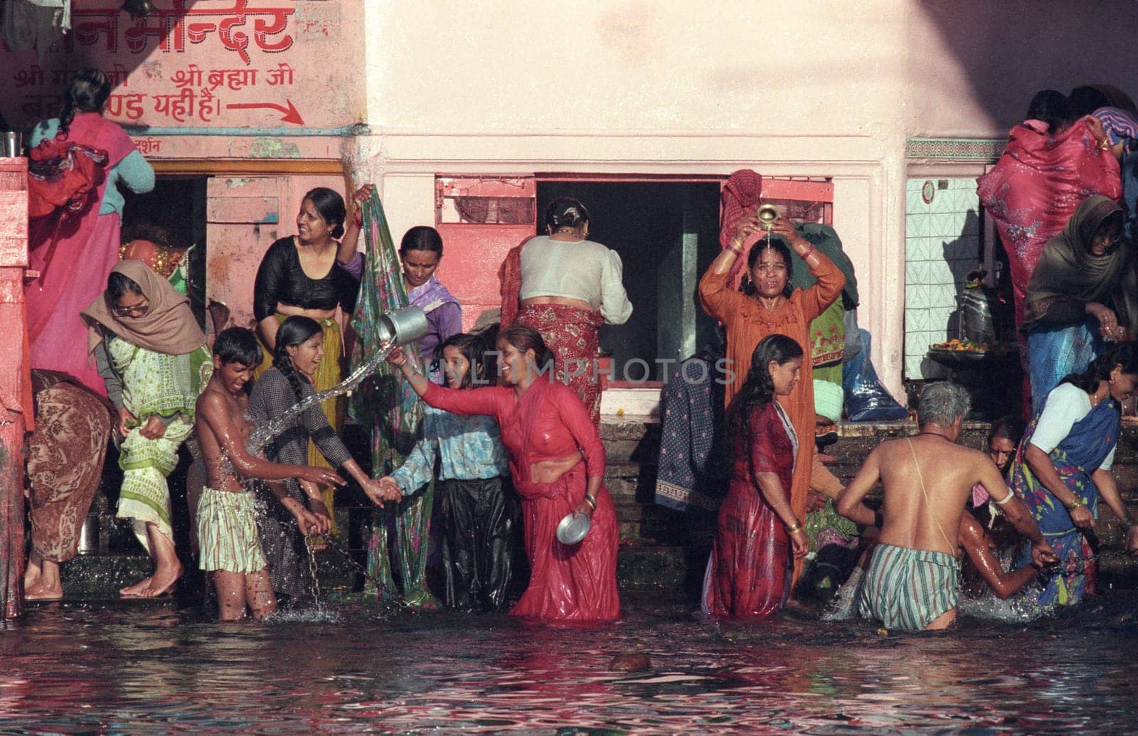 Hindi Pilgrim take a Bath in the Ganges River in the city of Haridwar in the Province Uttarakhand in India.  India, Haridwar, February, 1998