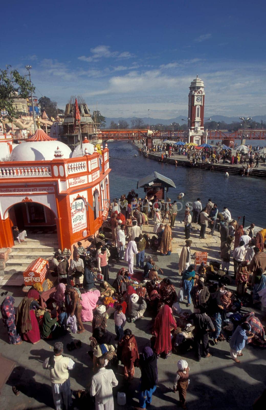 a view over public aerea with the Clock Tower at the Holy Ganges River in the city of Haridwar in the Province Uttarakhand in India.  India, Haridwar, February, 1998