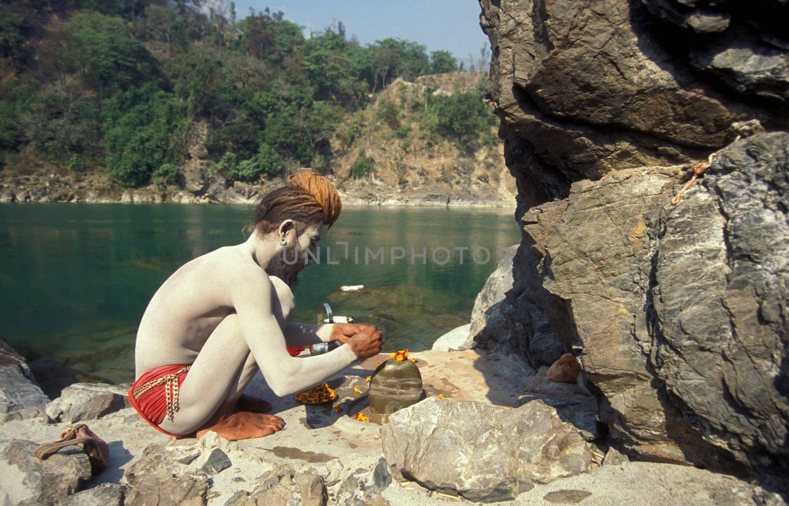 a Holy men and Street Sadhus at the Holy Ganges River in the city of Rishikesh in the Province Uttarakhand in India.  India, Rishikesh, February, 1998