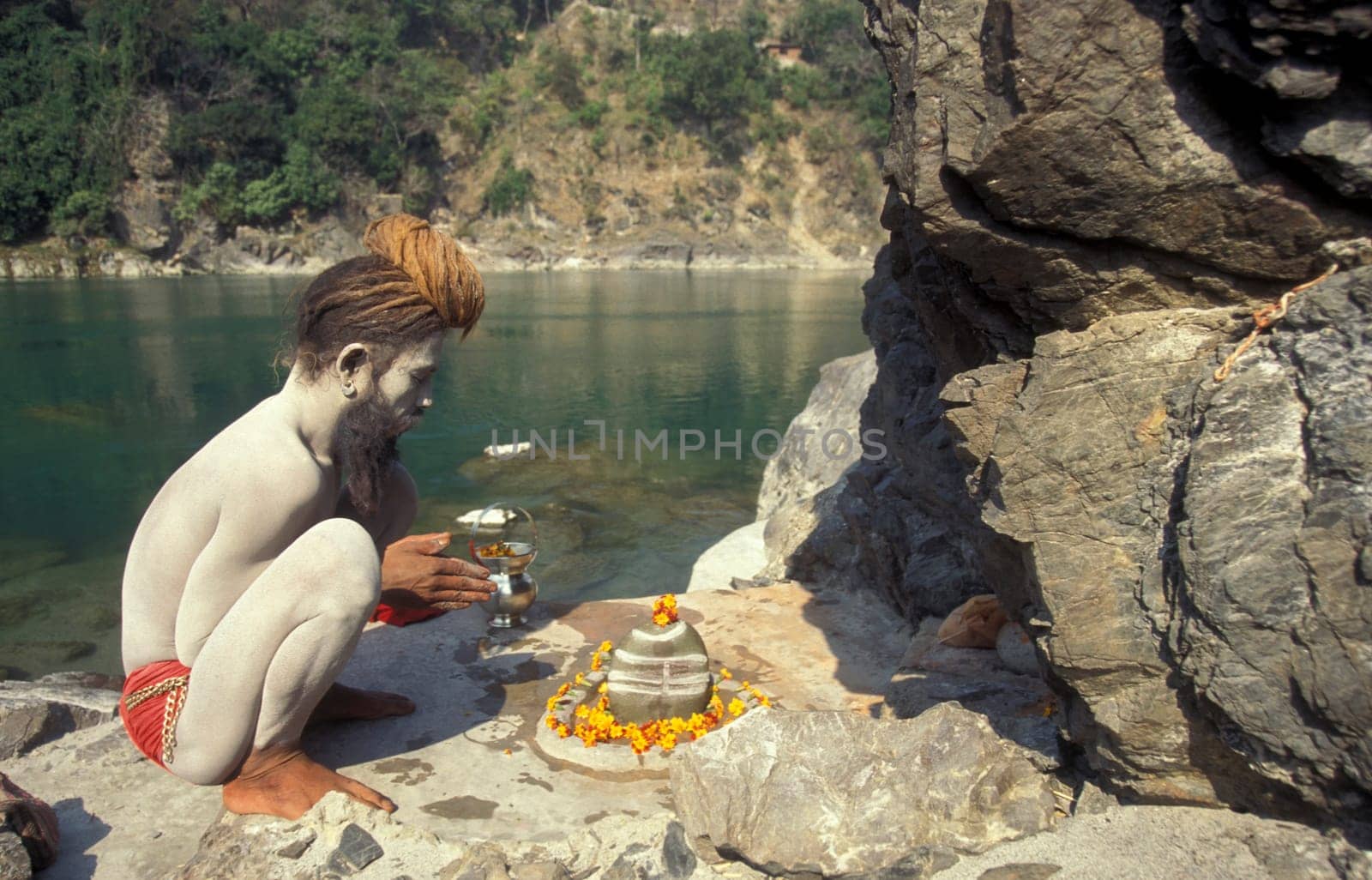 a Holy men and Street Sadhus at the Holy Ganges River in the city of Rishikesh in the Province Uttarakhand in India.  India, Rishikesh, February, 1998