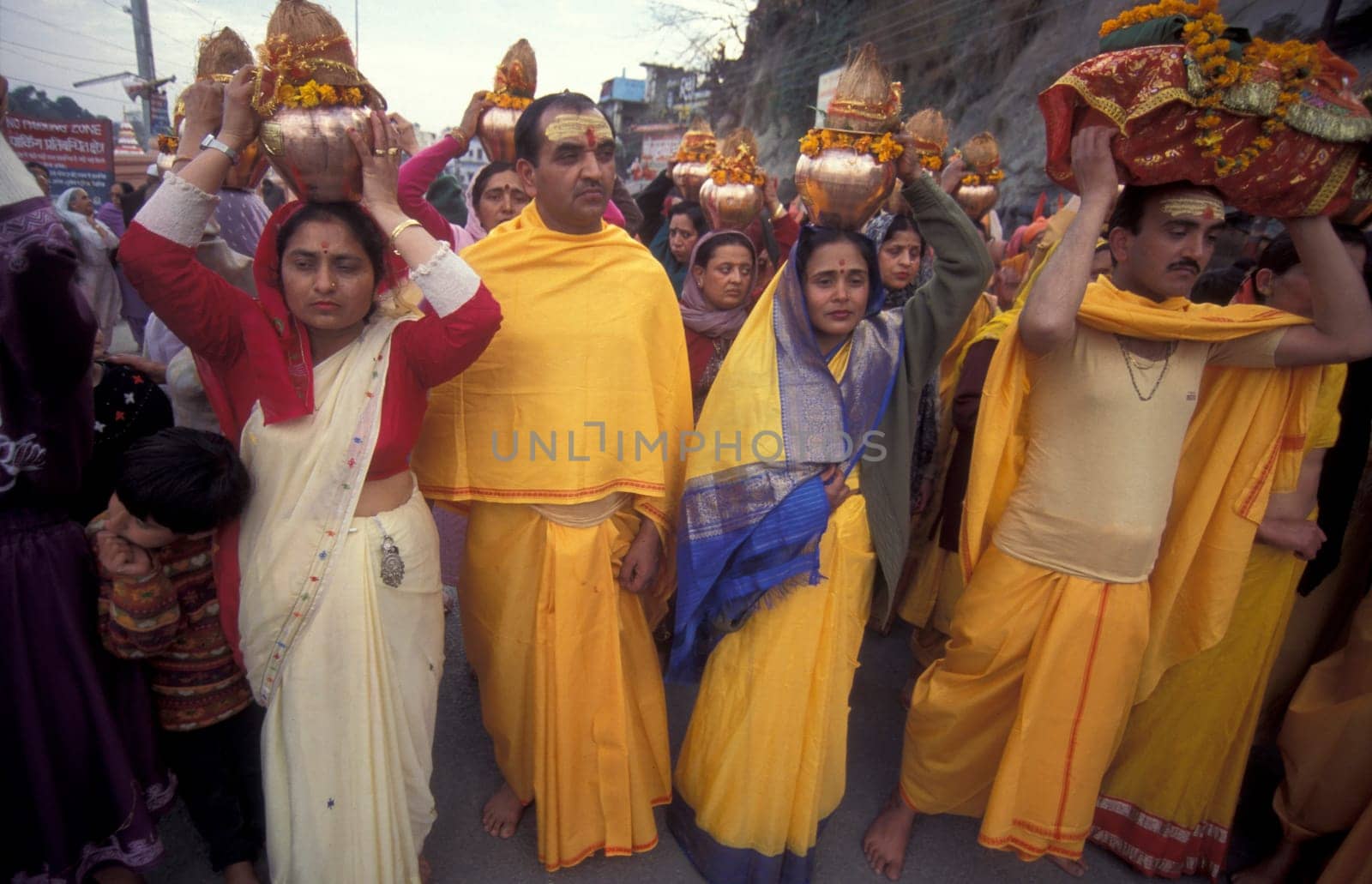 Hindi Pilgrim at a ceremony at the Holy Ganges River in the city of Haridwar in the Province Uttarakhand in India.  India, Haridwar, February, 1998