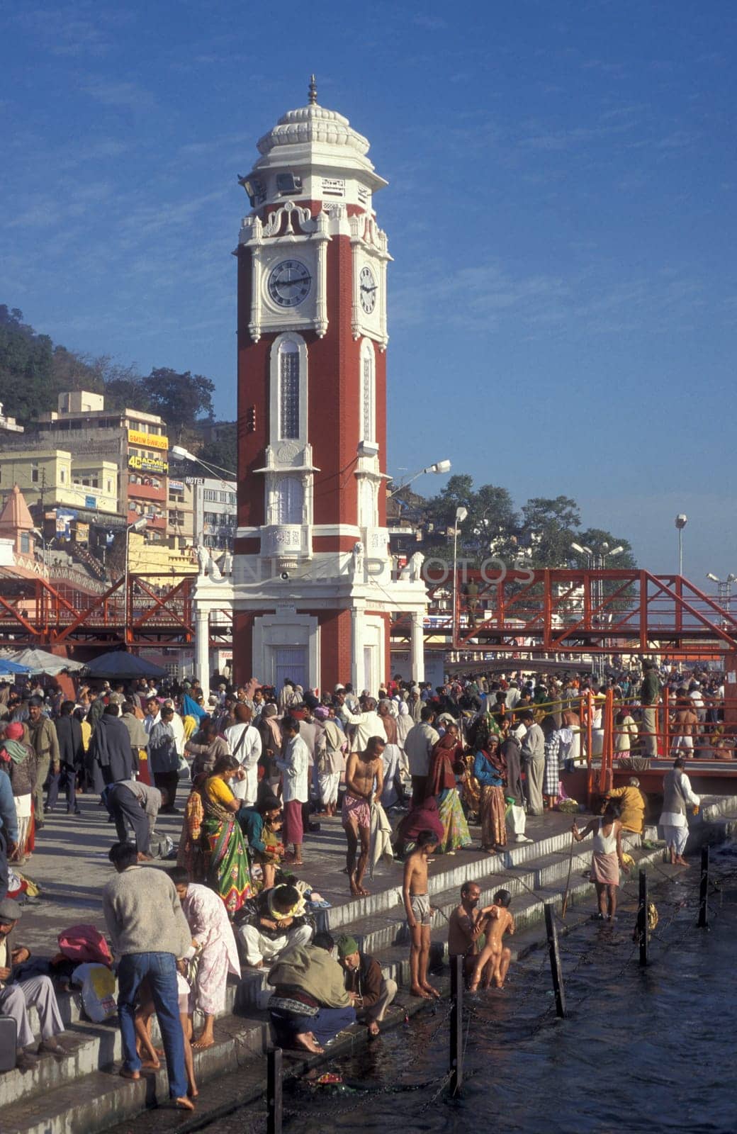 a view over public aerea with the Clock Tower at the Holy Ganges River in the city of Haridwar in the Province Uttarakhand in India.  India, Haridwar, February, 1998
